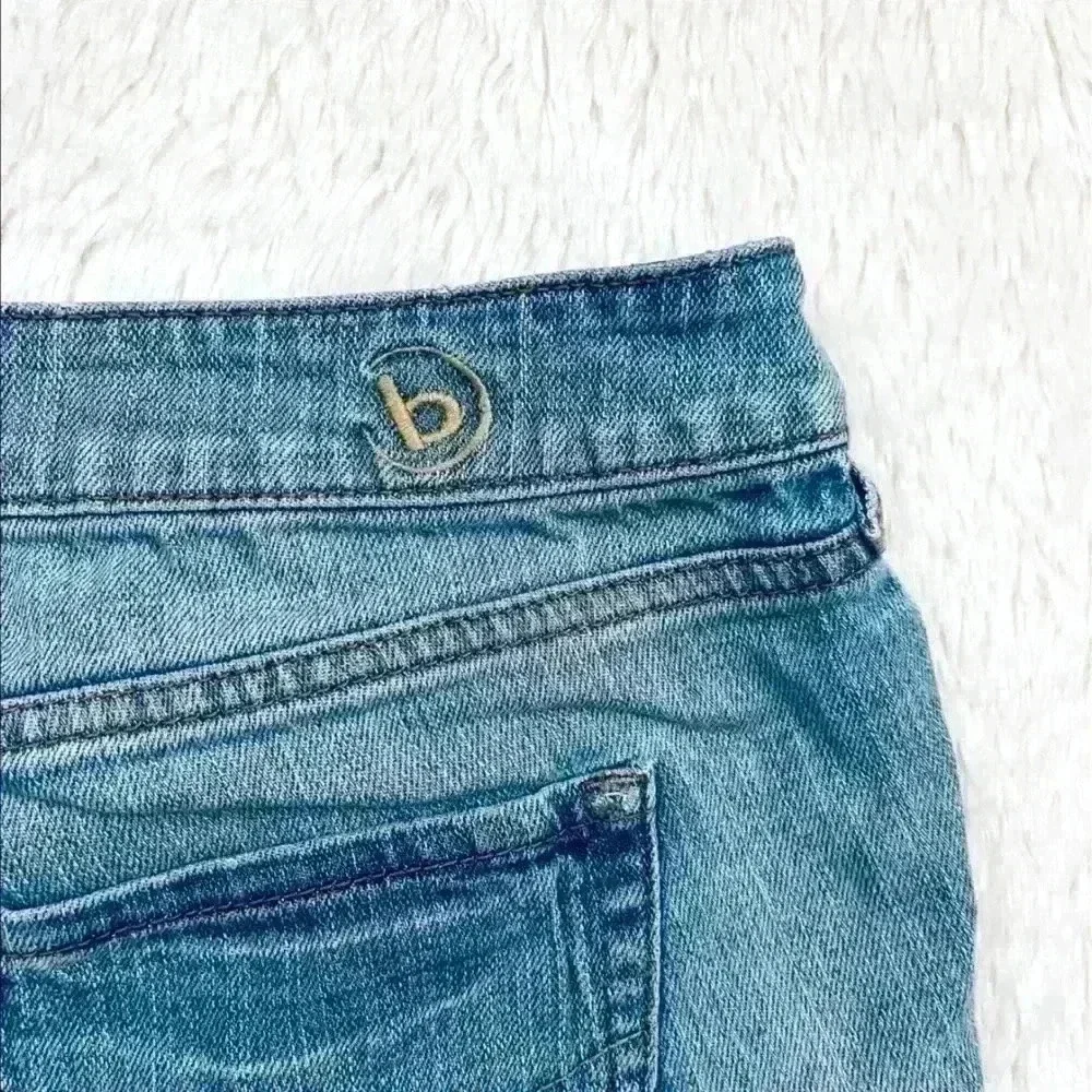 B By‎ Bullhead Med Wash Lowrise Distress Faded Cheeky Raw Hem Jean Shorts Size 9